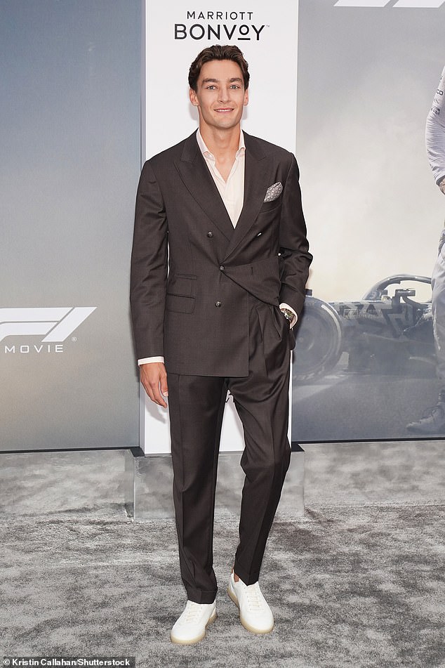 George Russel opted for a grey suit, complete with a white shirt and trainers