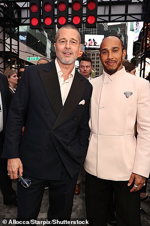 Lewis later posed for a snap with Brad