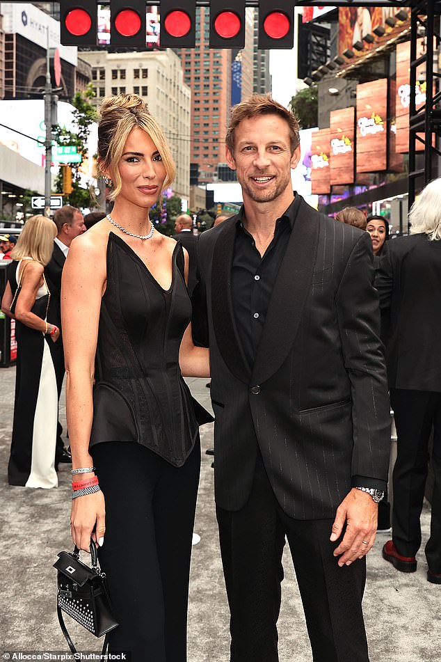 Brittny wore a figure-hugging black corset and trousers, while Jenson opted for a pinstripe suit