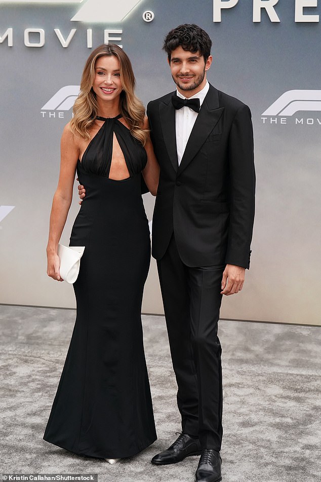 Esteban Ocon dressed to impress in a black tuxedo, while his girlfriend Flavy Barla stunned in a figure-hugging gown