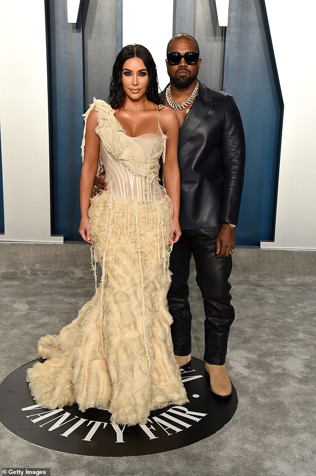 Kim Kardashian previously said that she 'protects' Kanye West in front of their four children North, 12, Saint, nine, Chicago, seven and Psalm, six. Pictured together in 2020