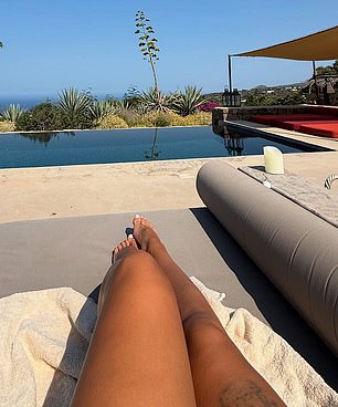 Vazquez posted a photo of herself chilling by the pool