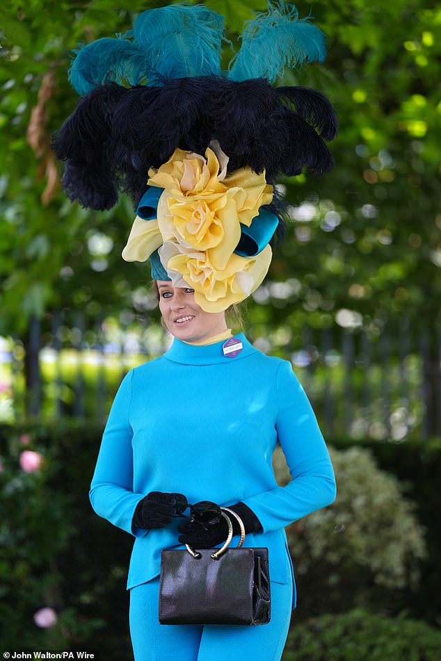 Hat's the spirit! This racegoer commanded attention with an enormous headpiece