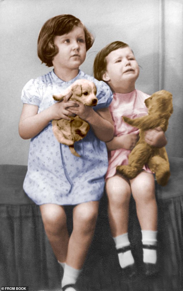 Kim Woodburn as a toddler with her older sister Gloria, who was known as Gezzie