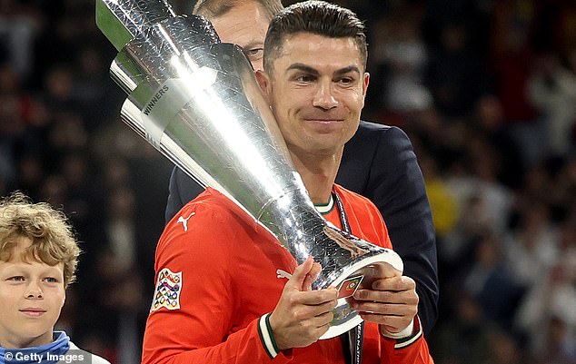Ronaldo, pictured with the Nations League trophy, wrote the message amid raging conflict between Iran and Israel