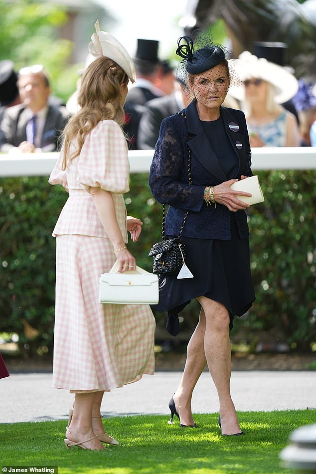 Sarah Ferguson opted for a smart navy ensemble and heels as she was spotted on the sidelines