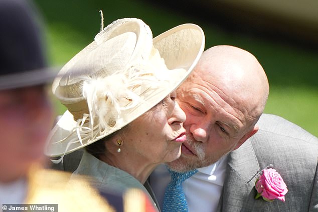 Mike Tindall greets his mother-in-law Princess Anne with a peck on the cheek at the Berkshire racecourse