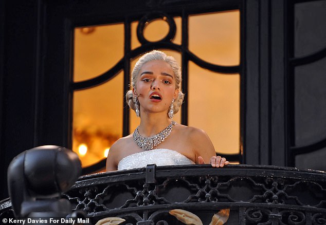Zegler sings from the balcony on Saturday night to crowds outside