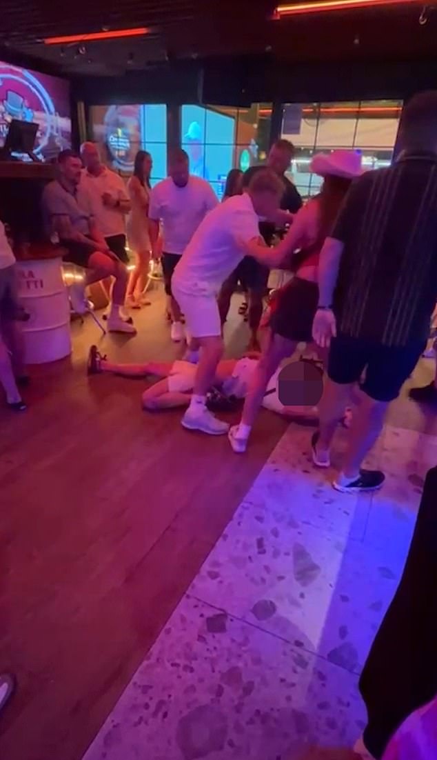 Footage shows the unnamed Brit being slammed to the floor by another man in the Spanish resort on Sunday night
