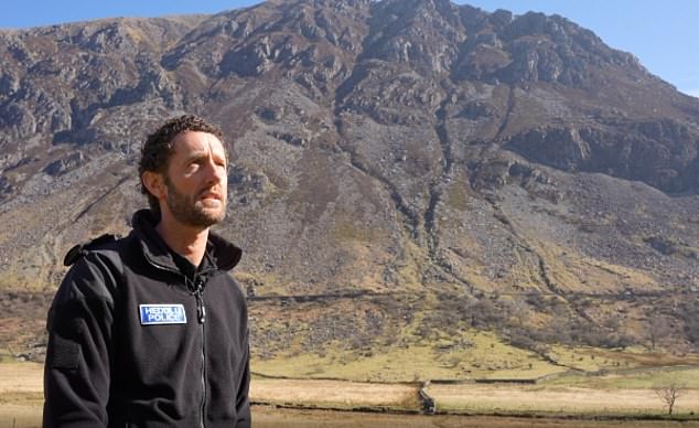 Speaking after the discovery, Sergeant Paul Terry (pictured) of the North Wales Police drone unit, who helped recover both men, described the case as one of the most extraordinary he has seen in his career