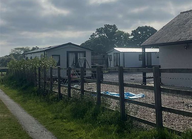 Hardstanding and fencing was constructed, with two mobile homes installed several weeks ago