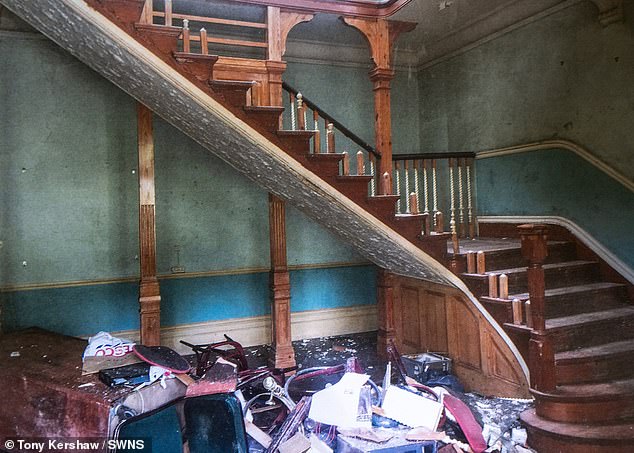 Clutter gathered beneath the main staircase during work done to the home