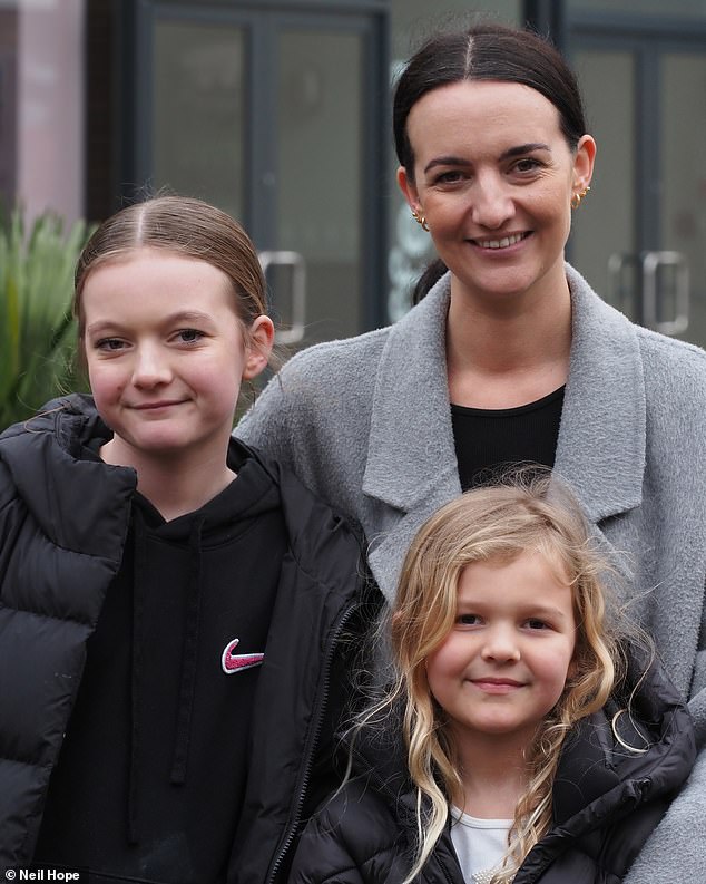 Pictured: Primary school teacher Georgia Wright, with her two children Lola, 11, (left) and Poppy, seven, who live in the area