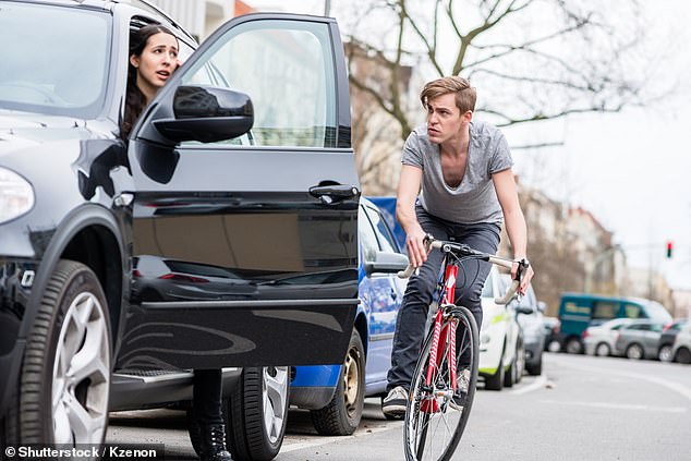 Drivers and told to use the 'Dutch Reach' technique when exiting vehicles on the roadside in a bid to prevent collisions with cyclists