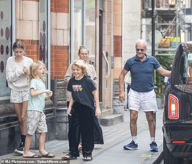 Kelsey couldn't have looked any happier spending quality time with his growing family