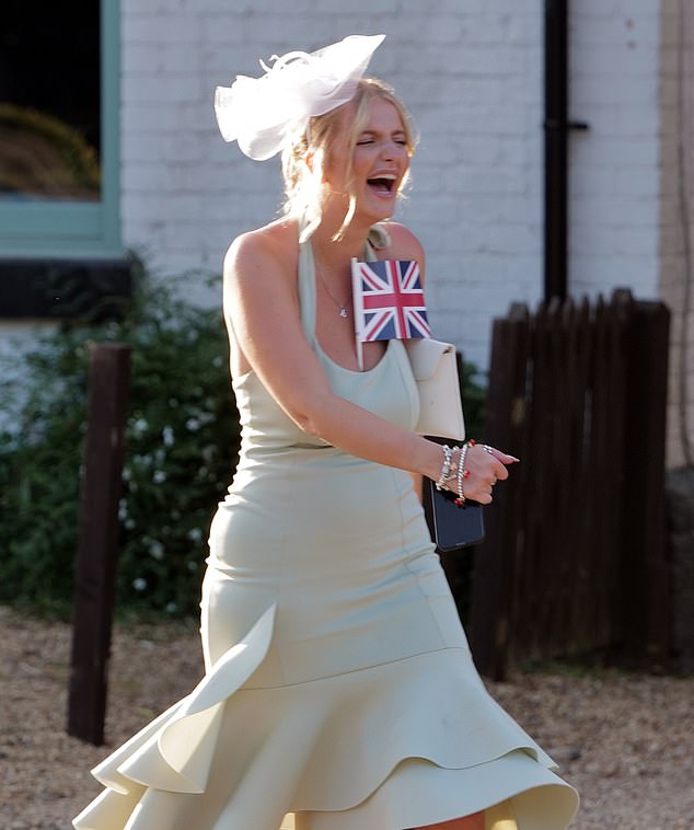 As the day went on many let their guards down and embraced the British spirit with one carrying a flag on her chest