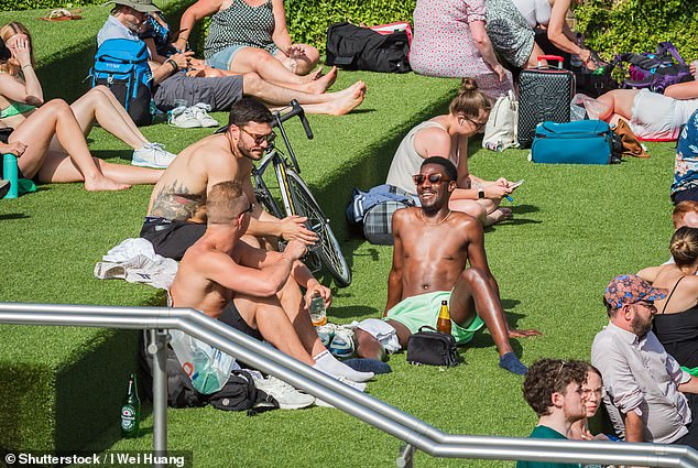 As the UK prepares for the first heatwave of the year, the Met Office warns that maximum temperatures of 46.6°C (115.9°F) are now 'plausible' in today's climate. Pictured: Londoners enjoy the heat over the weekend