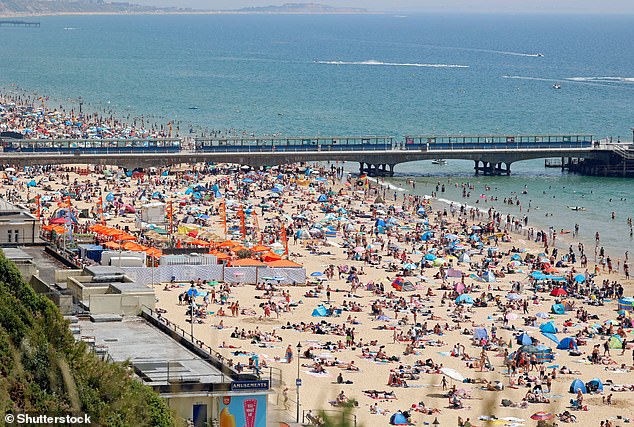 While the 2022 heatwave was an enjoyable time for many, it was also associated with over 3,000 heat-related deaths in England during the summer. Pictured: Sunbathers on Bournemouth Beach in June 2022