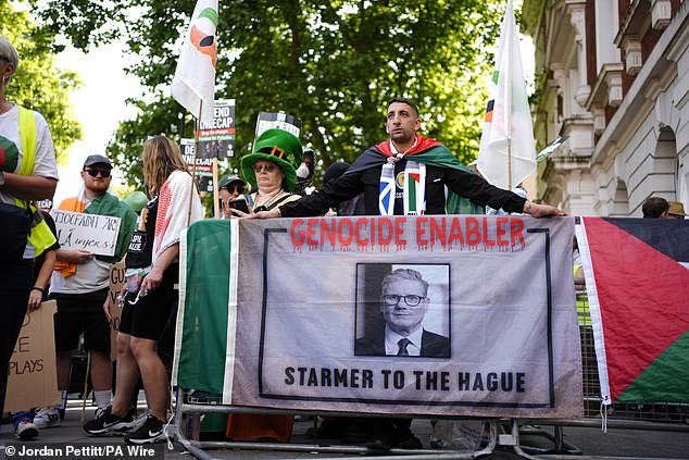 Supporters of Kneecap's Liam Og O Hannaidh protest outside Westminster Magistrates' Court