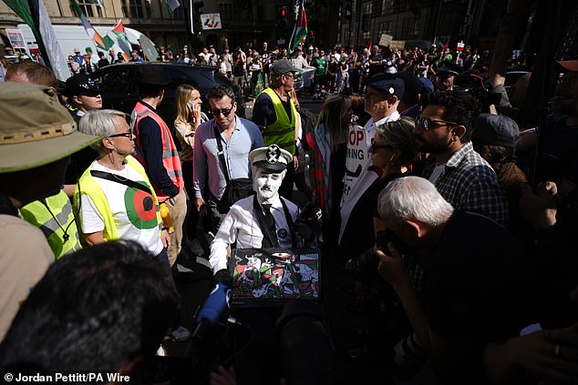 Huge crowds of people gathered outside Westminster Magistrates' Court in London today
