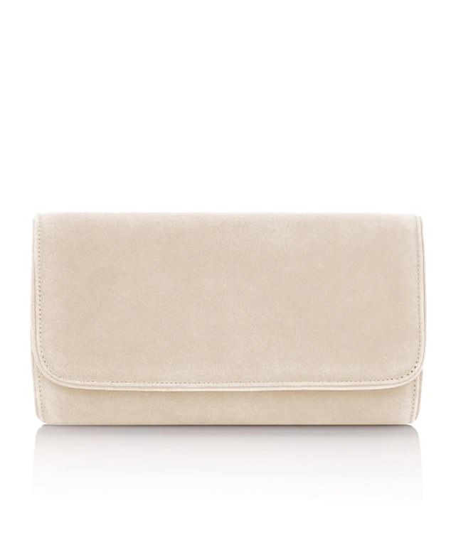 She paired the look with a £395 ‘Natasha’ Blush Suede Clutch by Emmy London, a brand which has been worn by both Catherine, Princess of Wales, and Zara Tindall