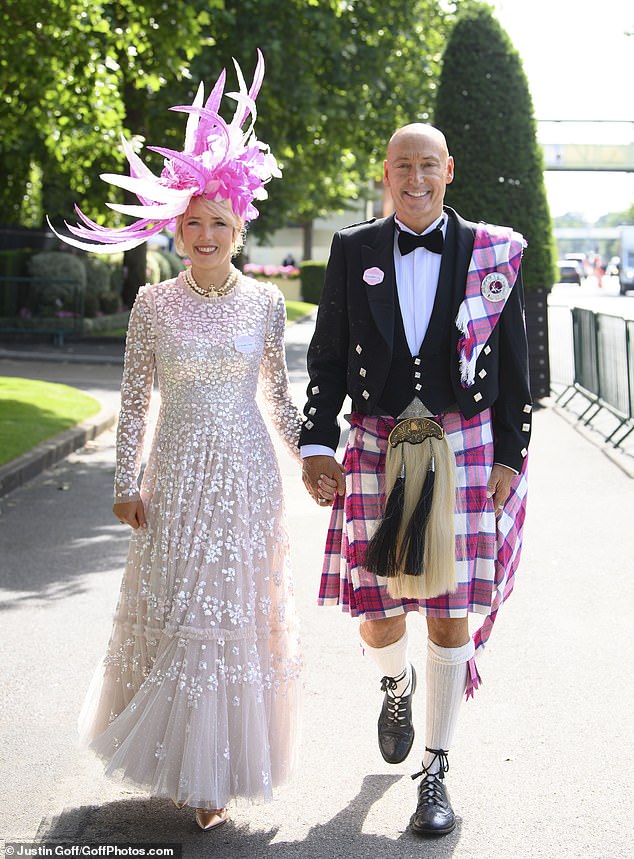 Couple goals: This chic pair put on a stylish display in all their finery as they arrived at Ascot