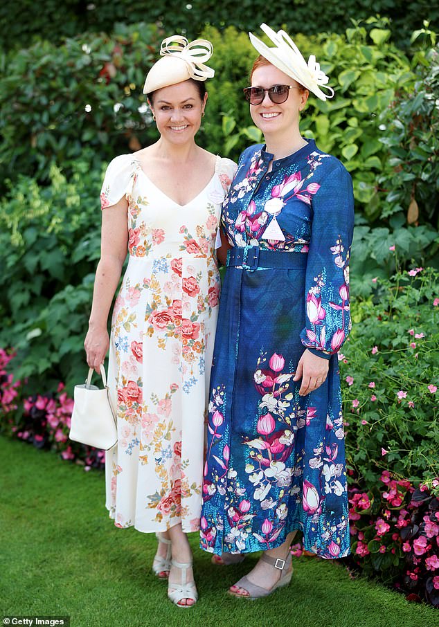 Double trouble! These women matched in floral ensembles as they attended the five-day event