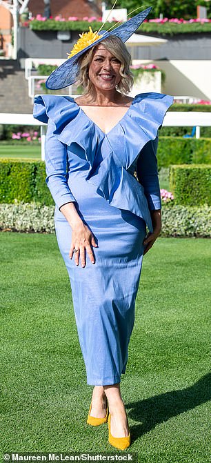 Beautiful in blue! This racegoer oozed glamour as she stepped out for the second day of racing