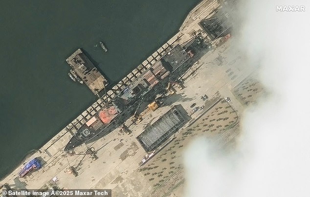 BEFORE: This handout satellite image courtesy of Maxar Technologies taken on May 18, 2025 shows a general view of the North Korean warship at the harbour ahead of its launch