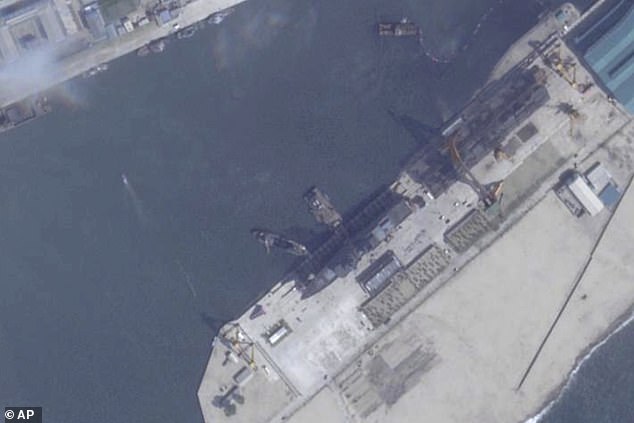 This satellite image from Planet Labs PBC, taken on May 20, shows a North Korean destroyer before it is said to have capsized
