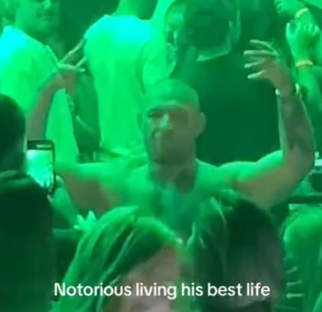 McGregor, shirtless in the club, was enjoying himself in the high tech venue