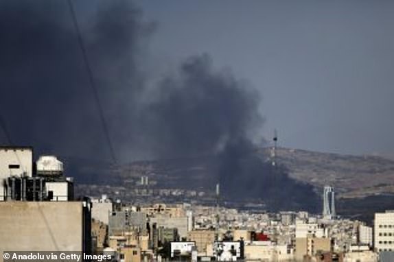 TEHRAN, IRAN  JUNE 18: Smoke blankets the sky above Tehran, Iran, following explosions in the capital after the Israeli army hit Iranian targets, on June 18, 2025. (Photo by Fatemeh Bahrami/Anadolu via Getty Images)