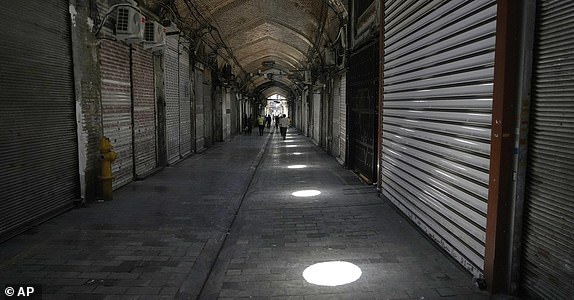 Shops remain shuttered Tehran's historic Grand Bazaar, Monday, June 16, 2025. (AP Photo/Vahid Salemi)