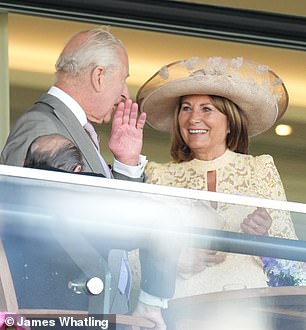 Charles chats to Carol Middleton during the second day of Royal Ascot