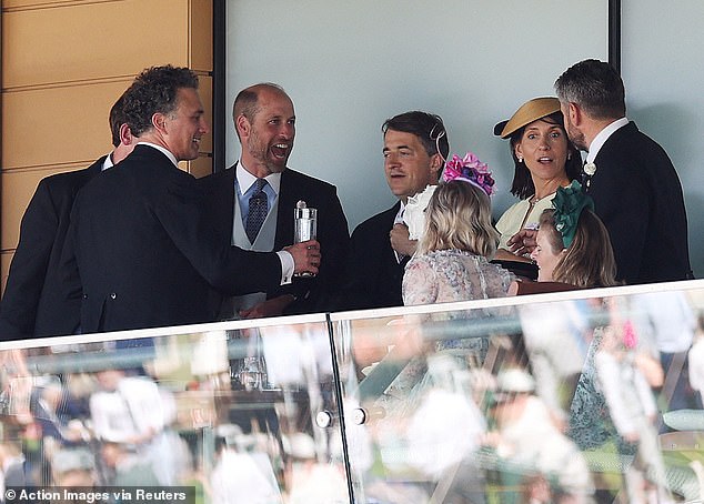 Having a Wales of a time! Prince William appeared in fantastic spirits in the stands