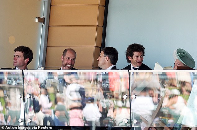 William, Prince of Wales in the stands during the races
