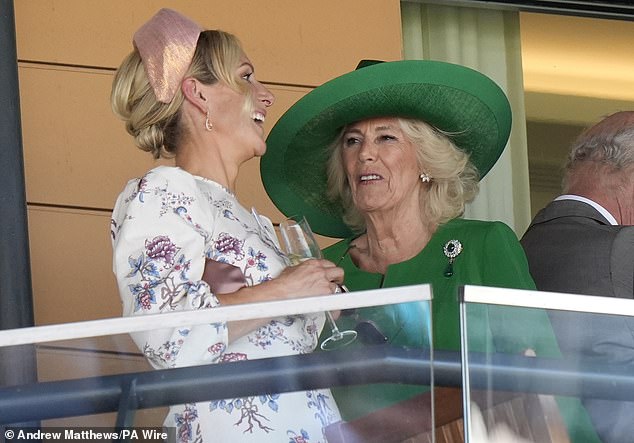Zara Tindall was pictured laughing with Queen Camilla as she enjoyed some bubbly