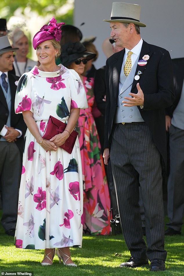 Sophie and Princess Anne's husband Vice Admiral Sir Tim Laurence chat to one another