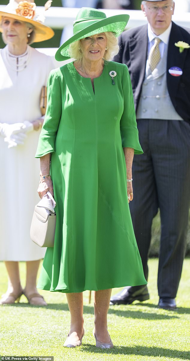 Queen Camilla looked elegant in leaf green as she opted for a bright look for day two