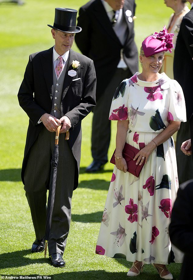Sophie (pictured with her husband the Duke of Edinburgh) looked radiant in a floral white and pink dress, which she teamed with a fuchsia hat
