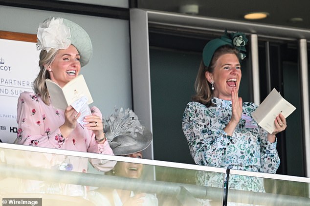 (L-R) Lucy van Straubenzee, Alizee Thevenet and Lady Laura Meade watch a race