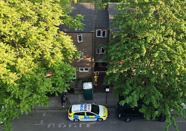Police at the scene of where the body of Jennifer Abbott was discovered in Camden