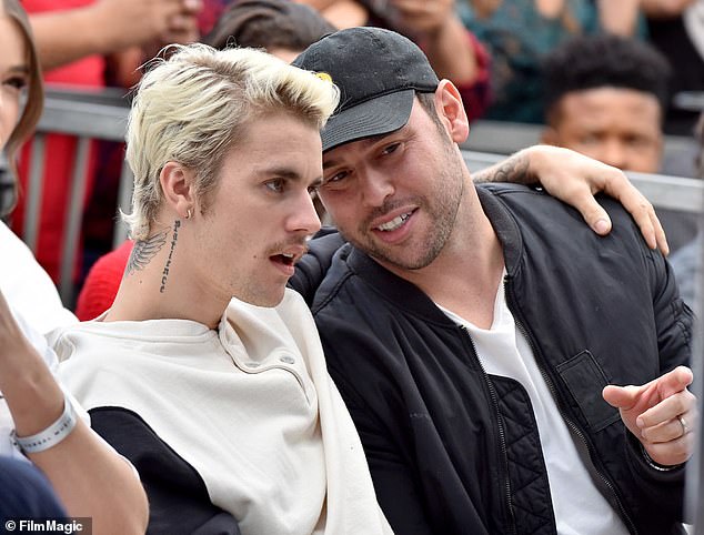 Bieber and Braun are reportedly negotiating after an independent audit determined the singer allegedly owes Braun more than $8M in unpaid commissions; seen together in 2020 in LA