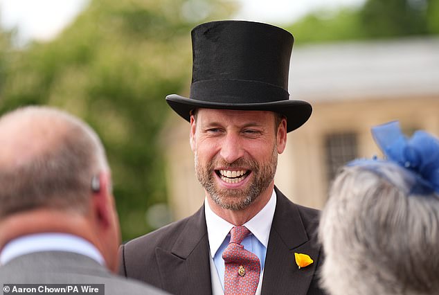 The Prince of Wales talks to guests during a Royal Garden Party at Buckingham Palace. William's seemingly small kind gestures are having a bigger impact than first meet the eye