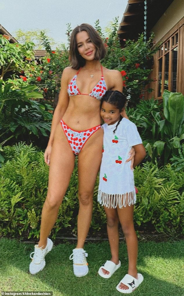 Khloe recently bared her washboard abs in a two-piece swimsuit, alongside seven-year-old daughter True