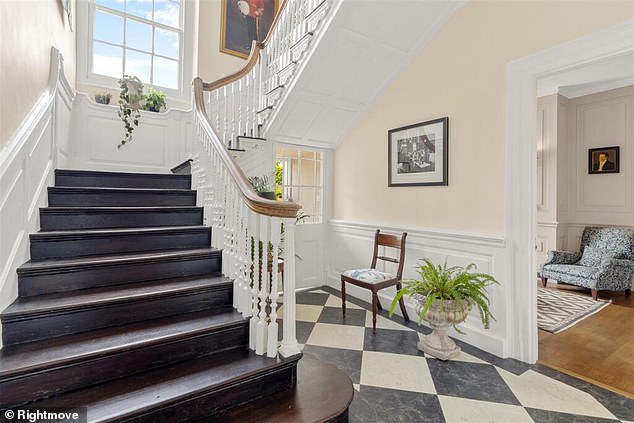 Make an entrance: The entrance hallway has a sweeping staircase luxurious interior