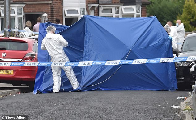 Forensics officers near the scene of Olivia Pratt-Korbel's murder in 2022