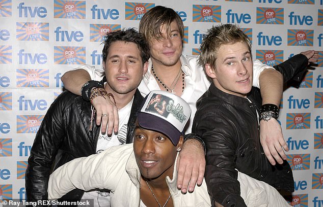 He added that Simon even gave an impromptu performance of No Worries, but joked he didn't allow any of them to do speeches as 'they know too much' (pictured in 2004)