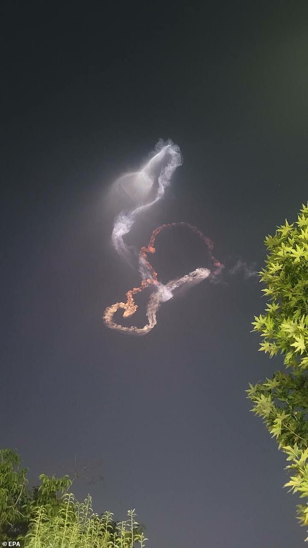 An Iranian handout photo of the trail of a missile fired at Israel yesterday