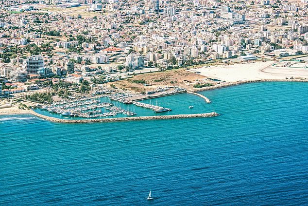 The cops were caught in the act in the town of Larnaca, Cyprus